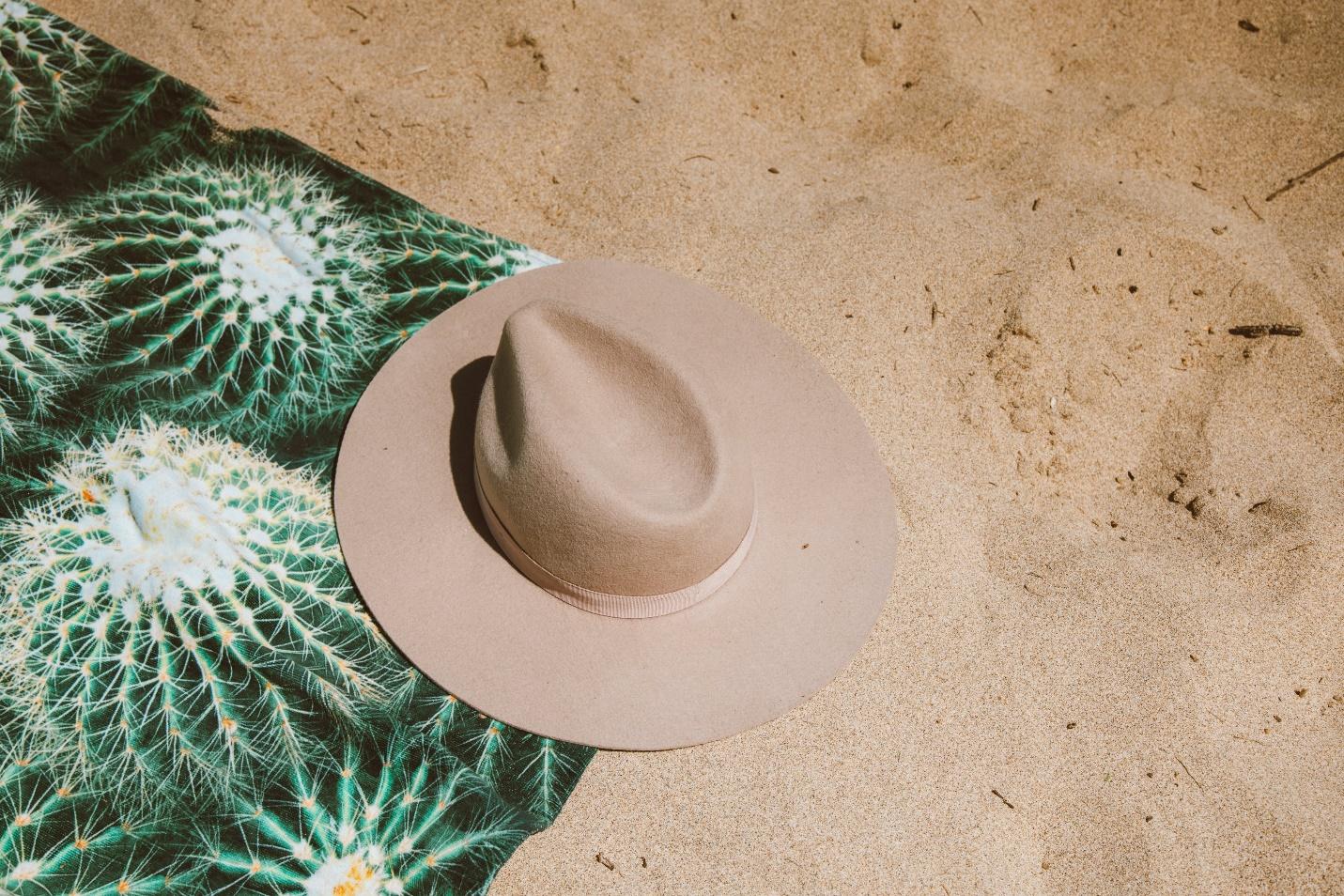 Brown Cowboy Hat on Sand